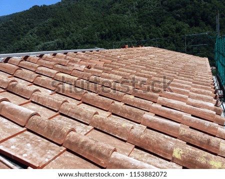 Roof building, Tuscany tiles, clay finishing phase, architecture old style design 