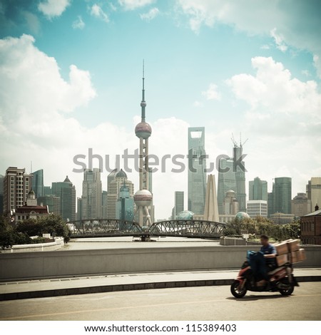 express personnel with modern city background in shanghai