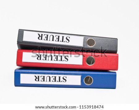 three  coloured files on top of each other with the German label "Steuer"(Tax)
