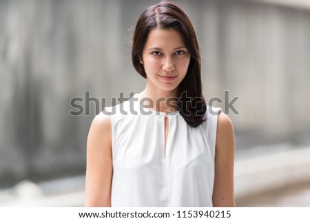 Portrait Of Beautiful Young Woman Outdoors
