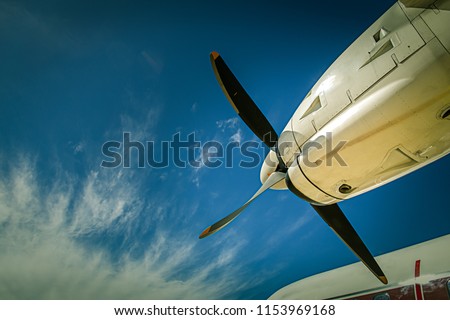 aircraft propeller blade and turboprop engines with blue sky background and copy space Royalty-Free Stock Photo #1153969168
