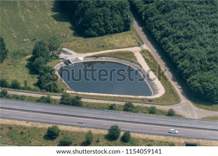 aerial view of an artificial lake at Harmonville in the department of Vosges in France