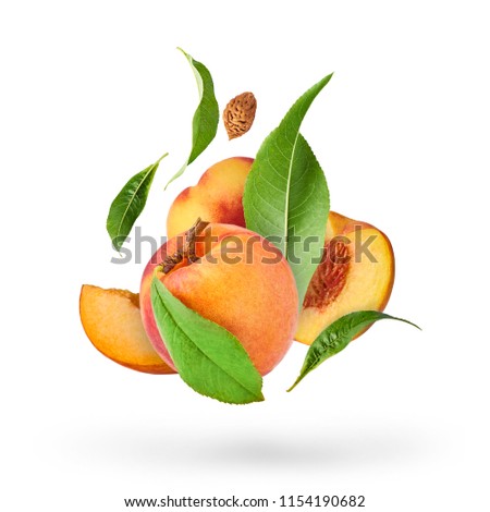 Flying fresh ripe peach with green leaves isolated on white background. Concept of food levitation, high resolution image
