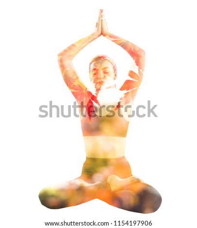 Young attractive smiling woman practicing yoga, sitting.Young beautiful woman practicing yoga and gymnastic. Wellness concept in gym