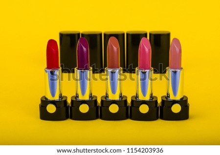 Set of lipsticks of different colors and shades for make-up. Studio Photo