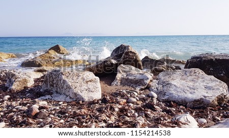 sea stone beach. Ionian Sea, Greece.