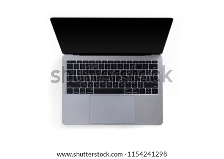 Top view of tabletop with laptop isolated on white background