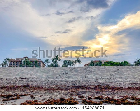 sunset hotel on the beach dunes