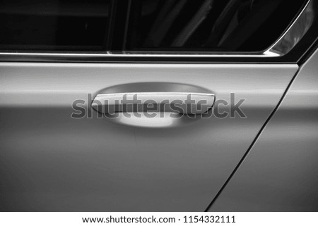 Luxury car door monochromatic background 