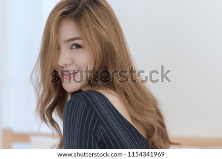 Close up of Pretty cheerful Asian woman