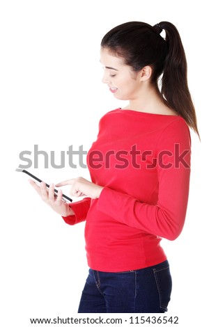 Beautiful happy young caucasian student woman using tablet computer , isolated on white