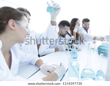 young microbiologists working in the laboratory.