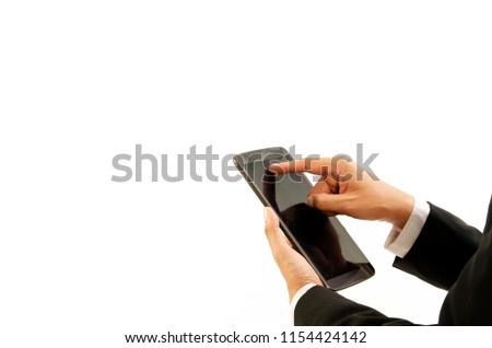 Close up of Business hand touching on screen tablet device Isolated on white backgrounds. Place for your text