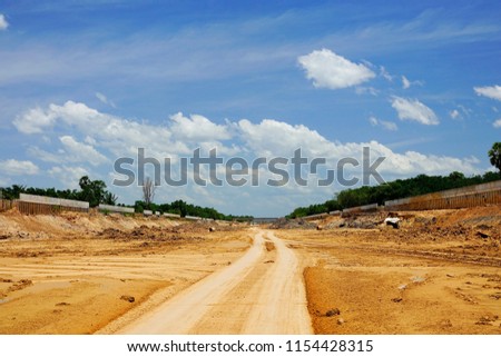 Dirt road view on nice day background.