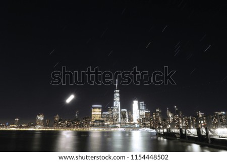A beautiful long exposure of downtown Manhattan on a starry night.