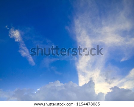 Soft focus to clear blue sky against white clounds  with beautiful colors and light for use as a natural Beautiful daytime background.season background.
