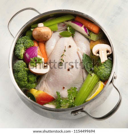 Chicken soup with vegetables. Ready for cooking. Healthy diet eating concept