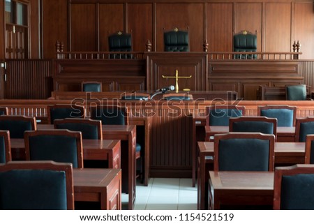 Table and chair in the courtroom of the judiciary. Royalty-Free Stock Photo #1154521519