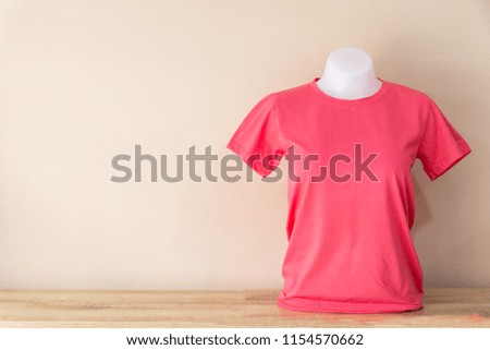 Pink T-Shirt isolated on a Pastel color background