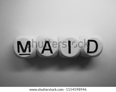 word maid spelled on dice