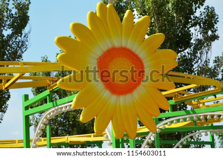 Yellow flower cartoon in luna park for children
