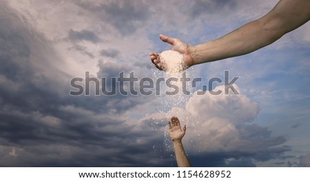 God Hand Pour Down Blessing Royalty-Free Stock Photo #1154628952