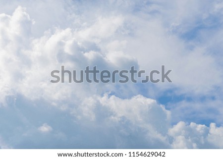 Blue sky and beautiful cirrus clouds on a sunny day, background texture