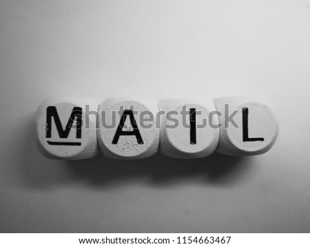 word mail spelled in dice
