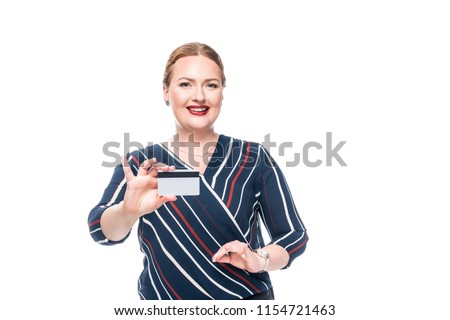 happy attractive businesswoman showing credit card isolated on white background 