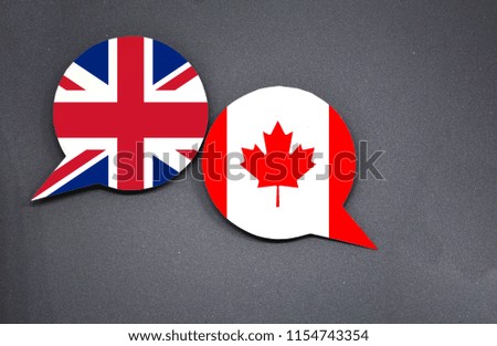 United Kingdom and Canada flags with two speech bubbles on dark gray background