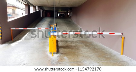 Automatic barrier gate to allow car parking access in property building by using RFID card to identify person and people. Strict, Security controlled exit and entry gates or entrance to Private area.