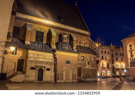 night long exposure concept of back yard empty square of medieval catholic church place with lantern illumination in old city district