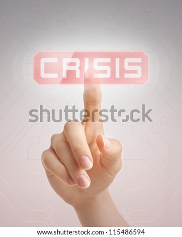 Hand pushing "crisis" virtual button.