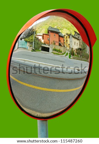 Natural security mirror isolated on green surface.