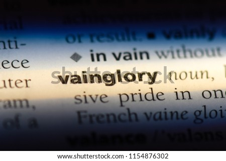 vainglory word in a dictionary. vainglory concept. Royalty-Free Stock Photo #1154876302
