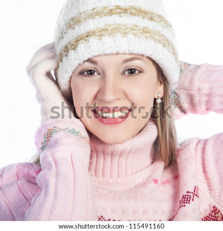 beautiful woman in warm clothing on white background