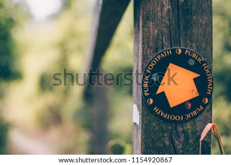 Public footpath sign Royalty-Free Stock Photo #1154920867