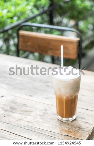 iced cappuccino coffee glass in cafe restaurant