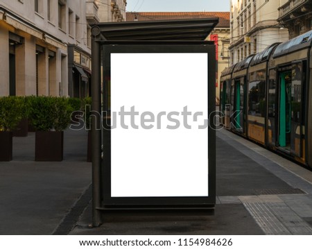 blank billboard mock up in milano city center tram station advertising display