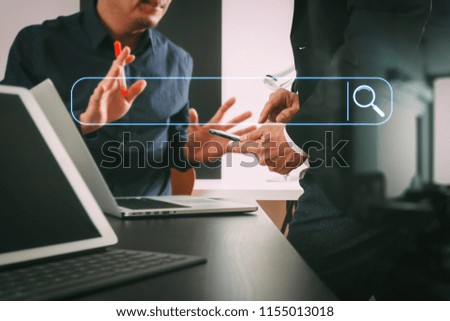 Searching Browsing Internet Data Information Networking Concept with blank search bar.co working team meeting concept,businessman using smart phone and digital tablet and laptop computer in office