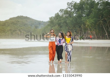 
Three beautiful girls travel the sea and have fun.