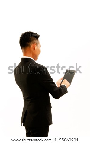 Asian Business man portrait backside views with hand holding tablet on white backgrounds