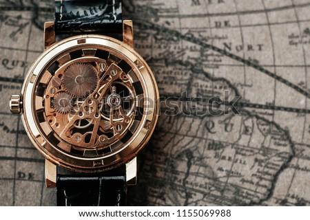 Mechanism, clockwork of a watch with jewels, close-up. Vintage luxury background. Time, work concept. Royalty-Free Stock Photo #1155069988