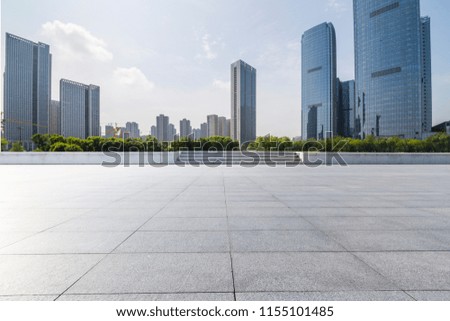  Empty floor with modern business office building and panoramic skyline