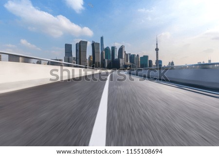 Empty Road with modern business office building and Panoramic skyline