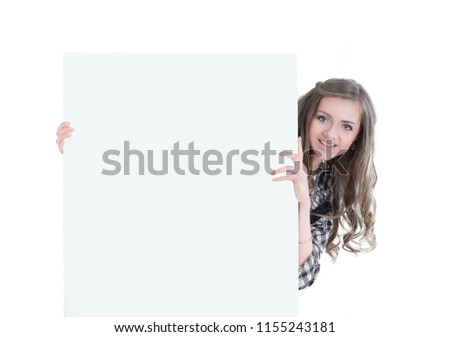 smiling young business woman showing a big blank banner
