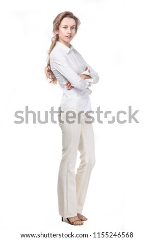 portrait of successful business woman in a stylish white pantsuit over a white background