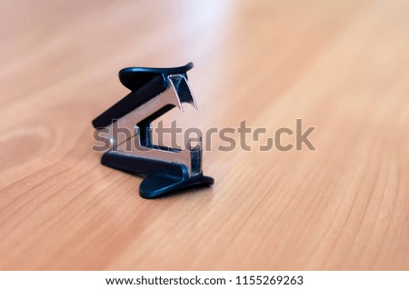 Staple remover on the table. stationery