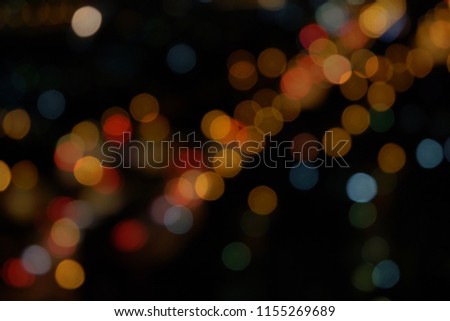 The bokeh lighting of the abstract in the night represents calm. Beautiful colors. And the mind is bright.