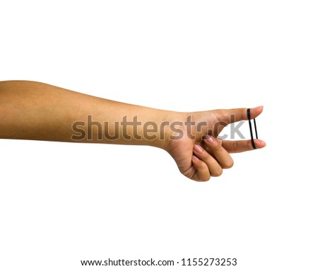 Hand isolated : A cropped female hand holding black rubber band on white background include clipping path Easy to use for your work. 